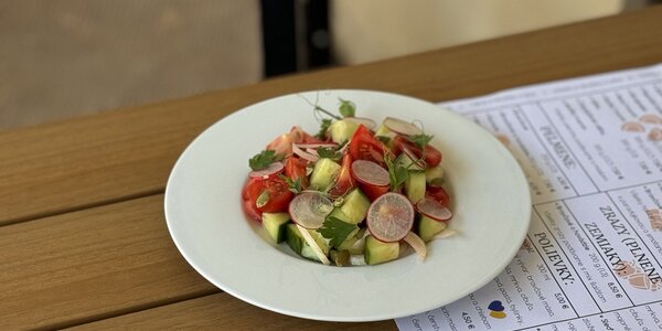 Mix vegetable salad with sour cream or oil