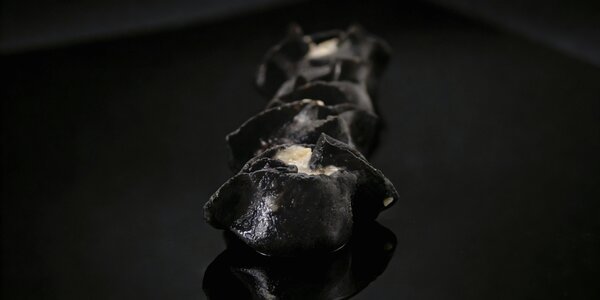10. Ravioli al nero di seppia **