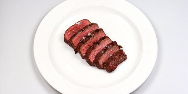 beef rump steak grilled over the charcoals 