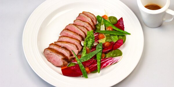 duck breast with pea puree,