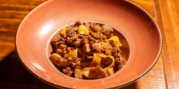 Pappardella al ragù di salsiccia e funghi porcino