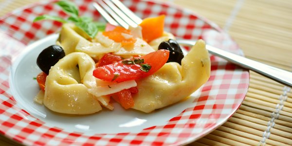 Tortelloni alla zucca pomodori e olive