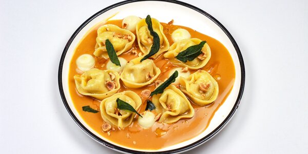 handfolded tortellini filled with foie gras and ricotta,
