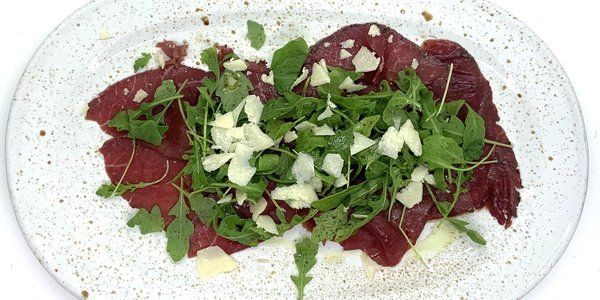 Carpaccio di Chianina rucola e Grana