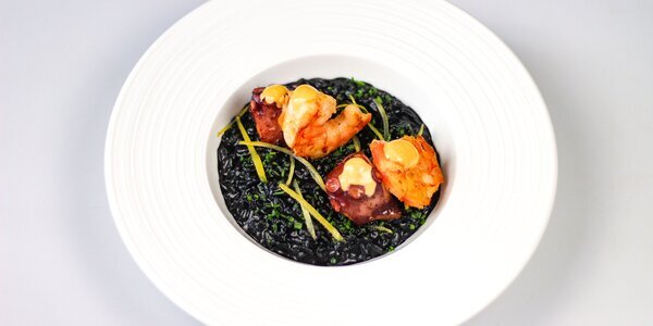 Creamy squid ink risotto with osctopus and tiger prawns,