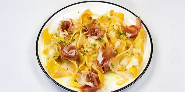 handfolded farfalle filled with fig ricotta,  