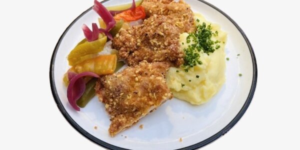 Fried chicken legs with cornflakes and chilli breadcrumb,