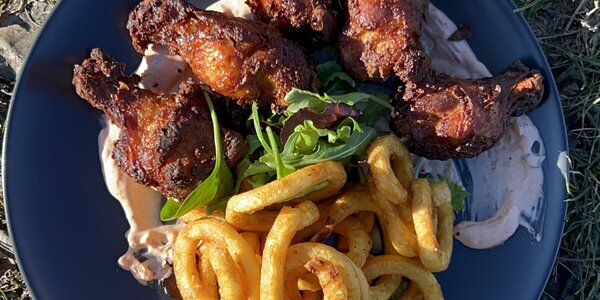 300g Chicken wings with curly fries and chipotle dip