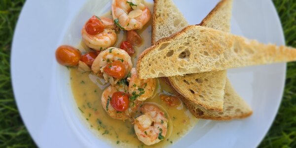 120g Grilled tiger prawns with tomatoes, butter sauce and toast
