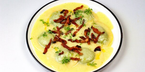 hand folded ravioli stuffed with spinach and ricotta,
